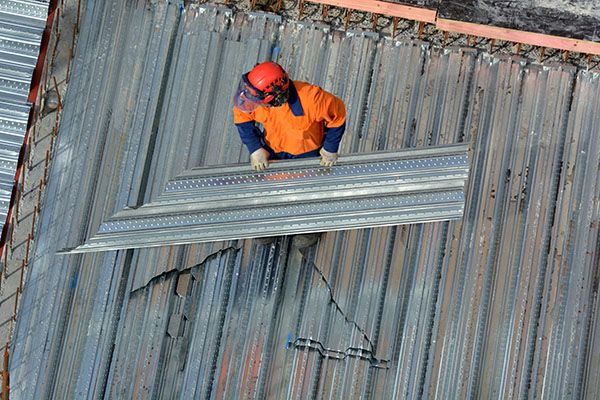 Installing Bondek at height poses a high-risk construction activity.