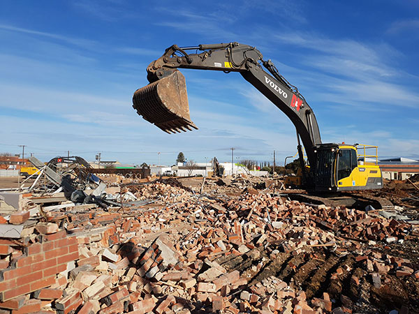 Demolition using an excavator SWMS
