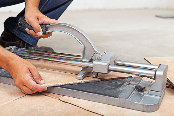 Sharp edges and flying debris are risks associated with working with a clinker tile cutter, Highlighting the necessity of following safety procedures.