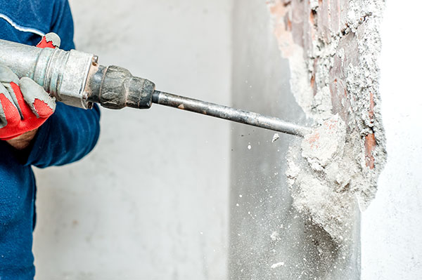 Using a Jackhammer/ Demolition hammer can create silica dust. Aways wear Respiratory Protective Equipment (RPE).