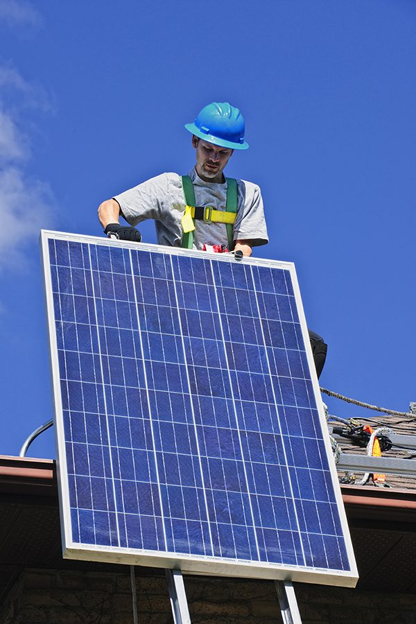 Ensure constant positive communication with co-workers when passing up solar panels and accessories.