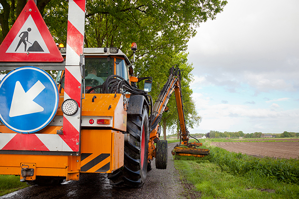 Prioritize roadside slashing safety by wearing high-visibility clothing, following traffic guidelines, and using proper equipment for a secure vegetation management process.